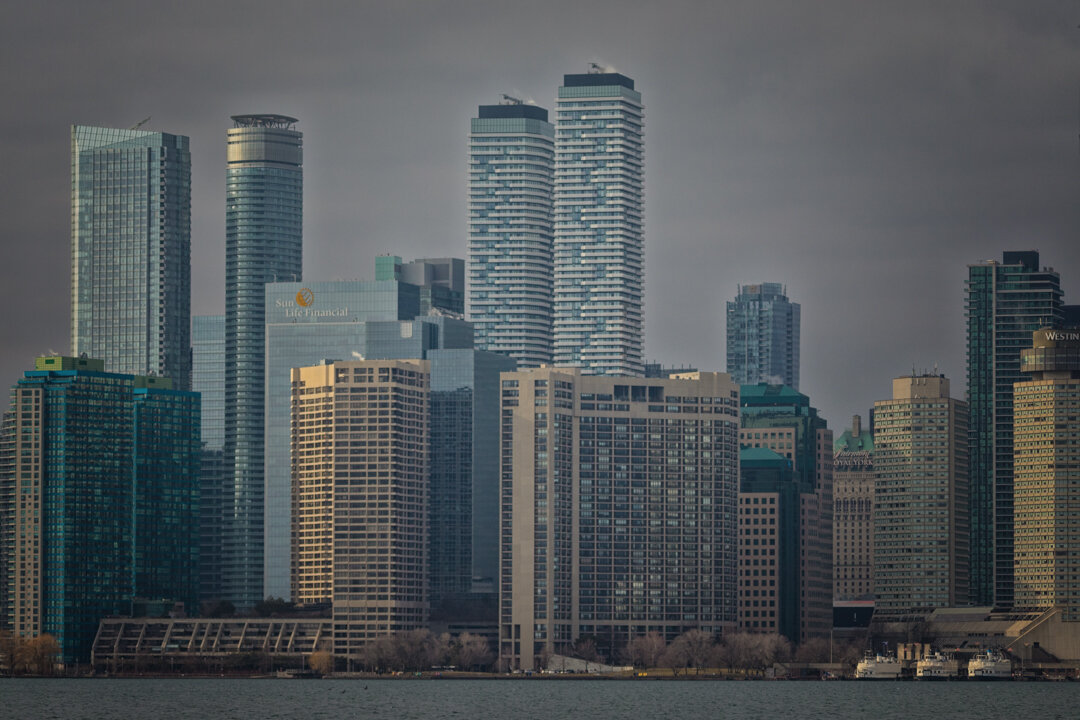  A view of residential skyscrapers and the Jack Layton Ferry dock along the waterfront of Toronto.  