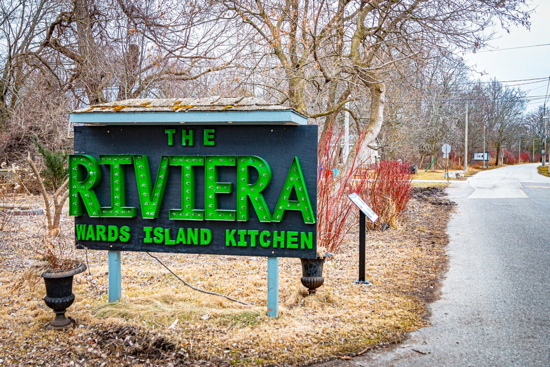  As we were walking down the street, we came by the sign for the Riviera  - Ward’s Island Kitchen. It was closed. It is only open from Friday to Sunday at this time of the year.  