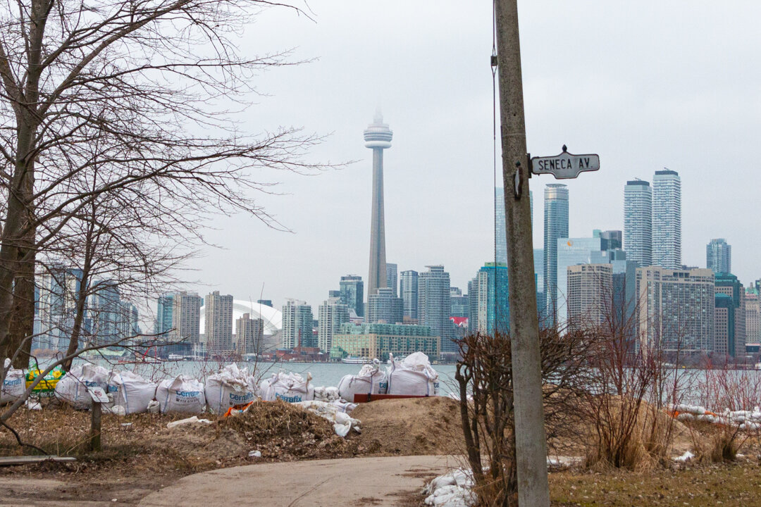  Along our walk of Algonquin Island, standing at the corner of Wyandot Avenue, and Seneca Avenue, is a great view of the CN Tower. in the foreground you can see a sand hill.  At one point last summer this spot was under about a foot or more of water.