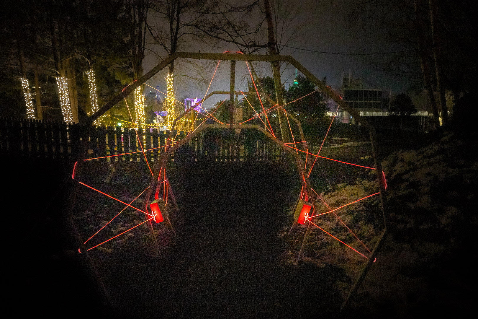  As we followed the trail, we came across a metal enclosure with red glowing strings.  This was one of the most popular spots for people and dogs to pass through. It was difficult to get a photo not only because of the traffic but it was also windy w