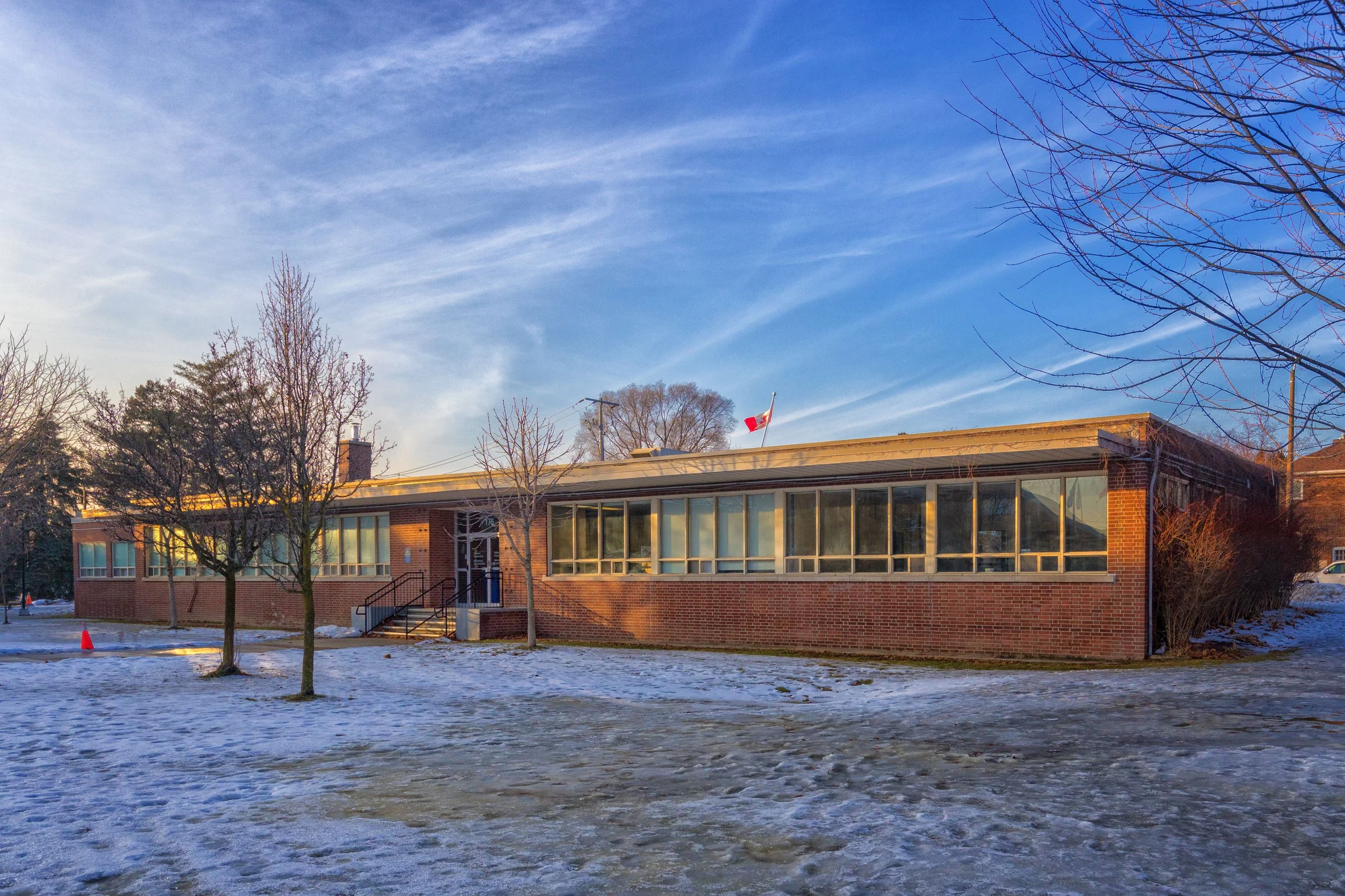 A low-rise civic building on the north side of the East York Civic Centre property