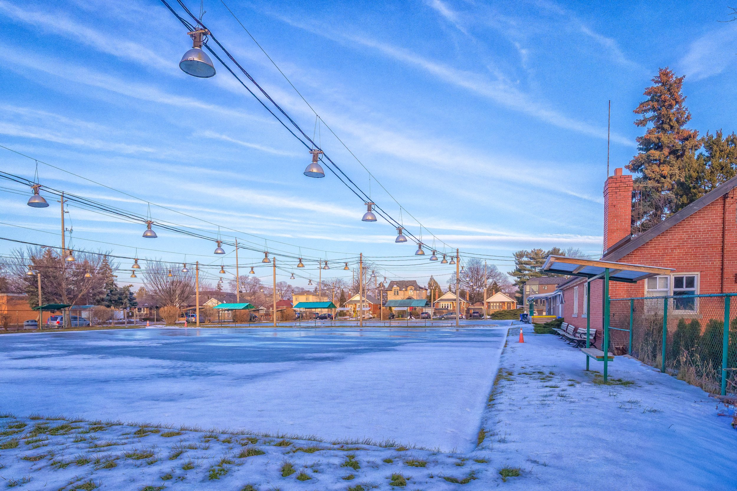 Frozen outdoor courts at East York Tennis Club during the winter season in Toronto.