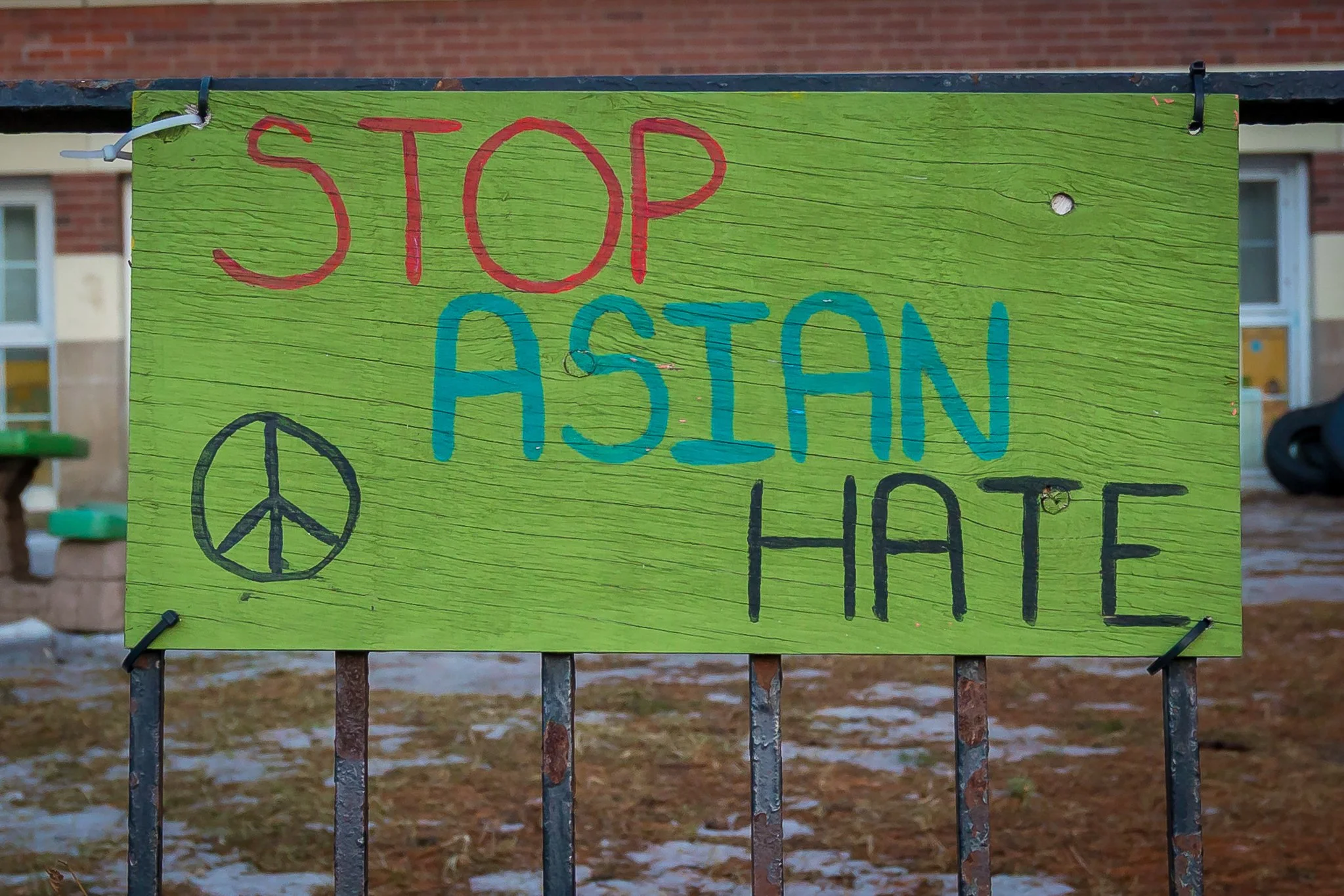 Handmade Stop Asian Hate sign at Wilkinson Junior Public School in the Danforth neighbourhood