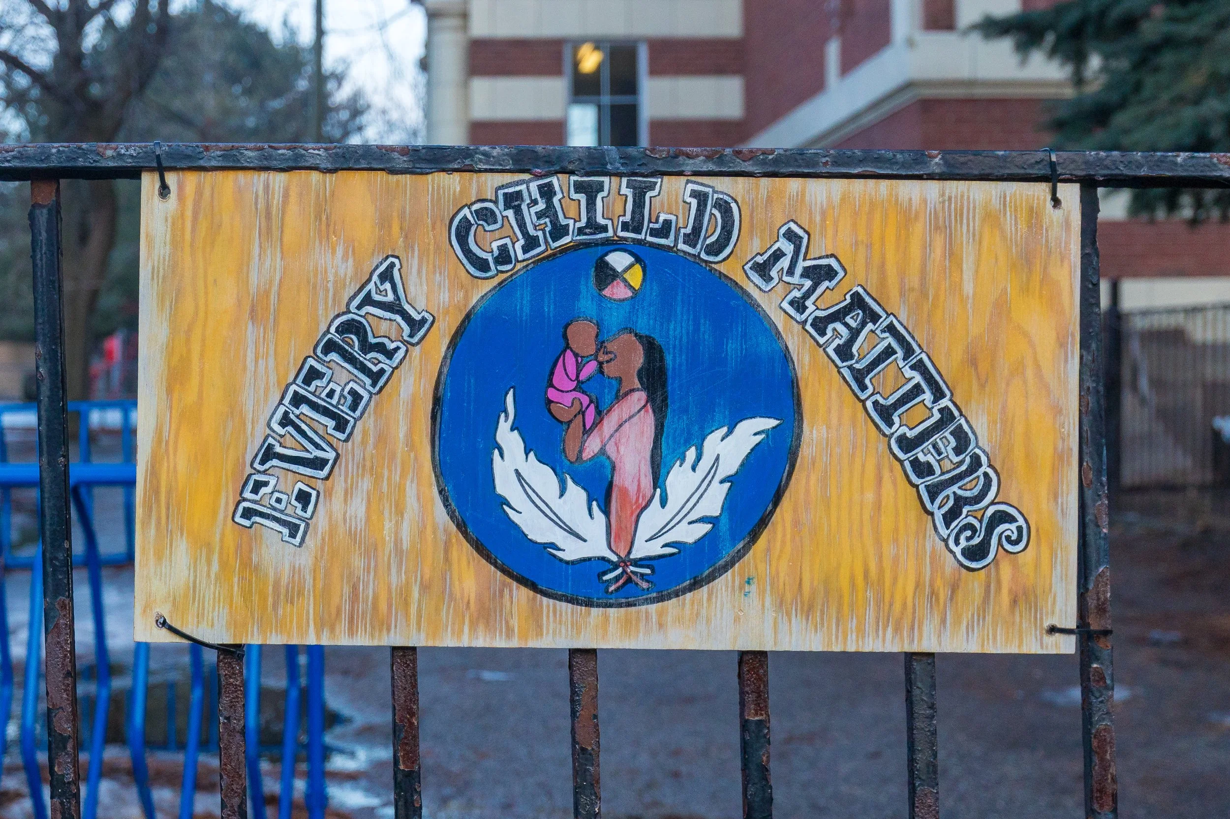 Every Child Matters sign displayed on the fence at Wilkinson Junior Public School in East York