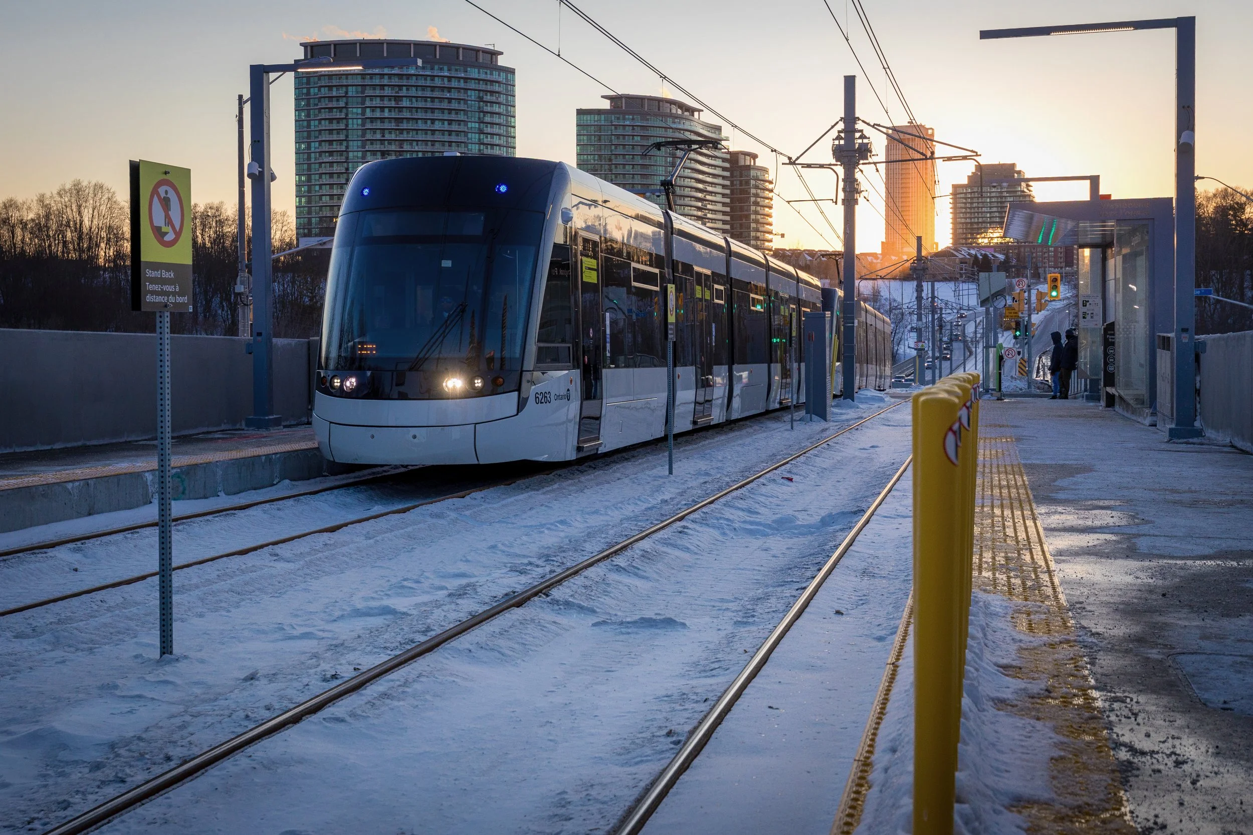 Eglinton Crosstown LRT train arriving at station