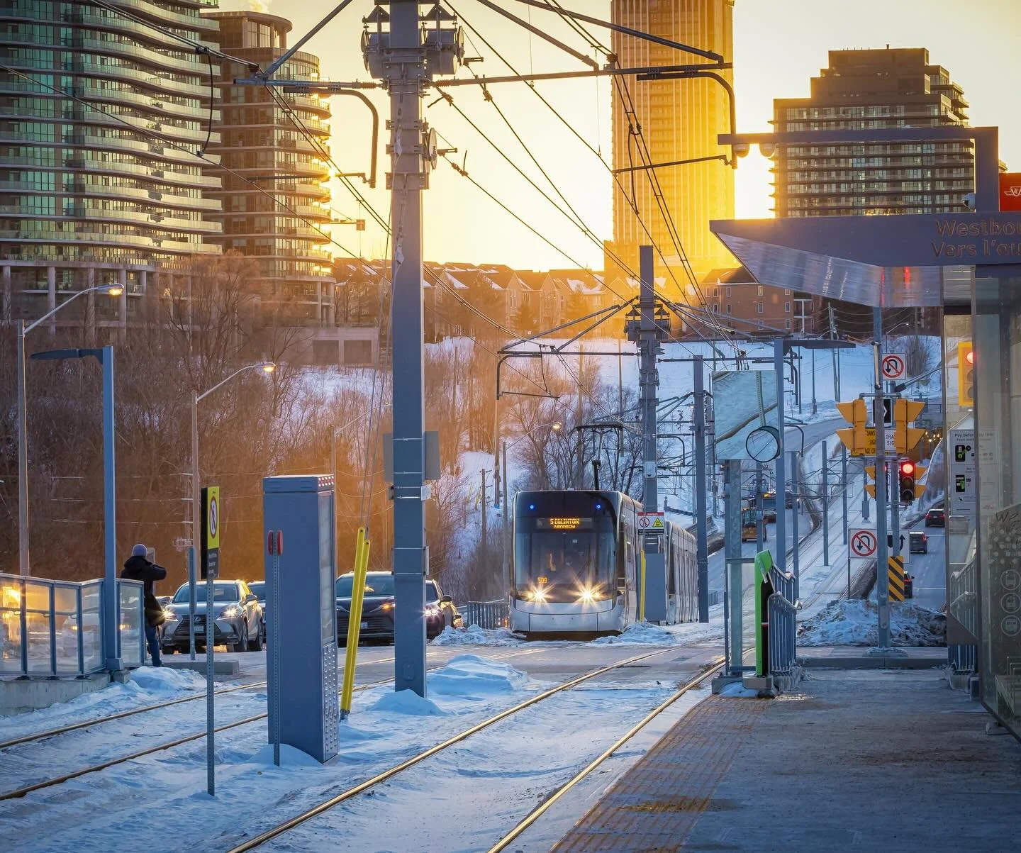 A light rail train approaches Sunnybrook Park Station on February 8, 2026, marking the first day of service for the long-awaited Eglinton Crosstown. Winter light, fresh tracks, and a moment years in the making as Toronto&rsquo;s newest rapid transit 
