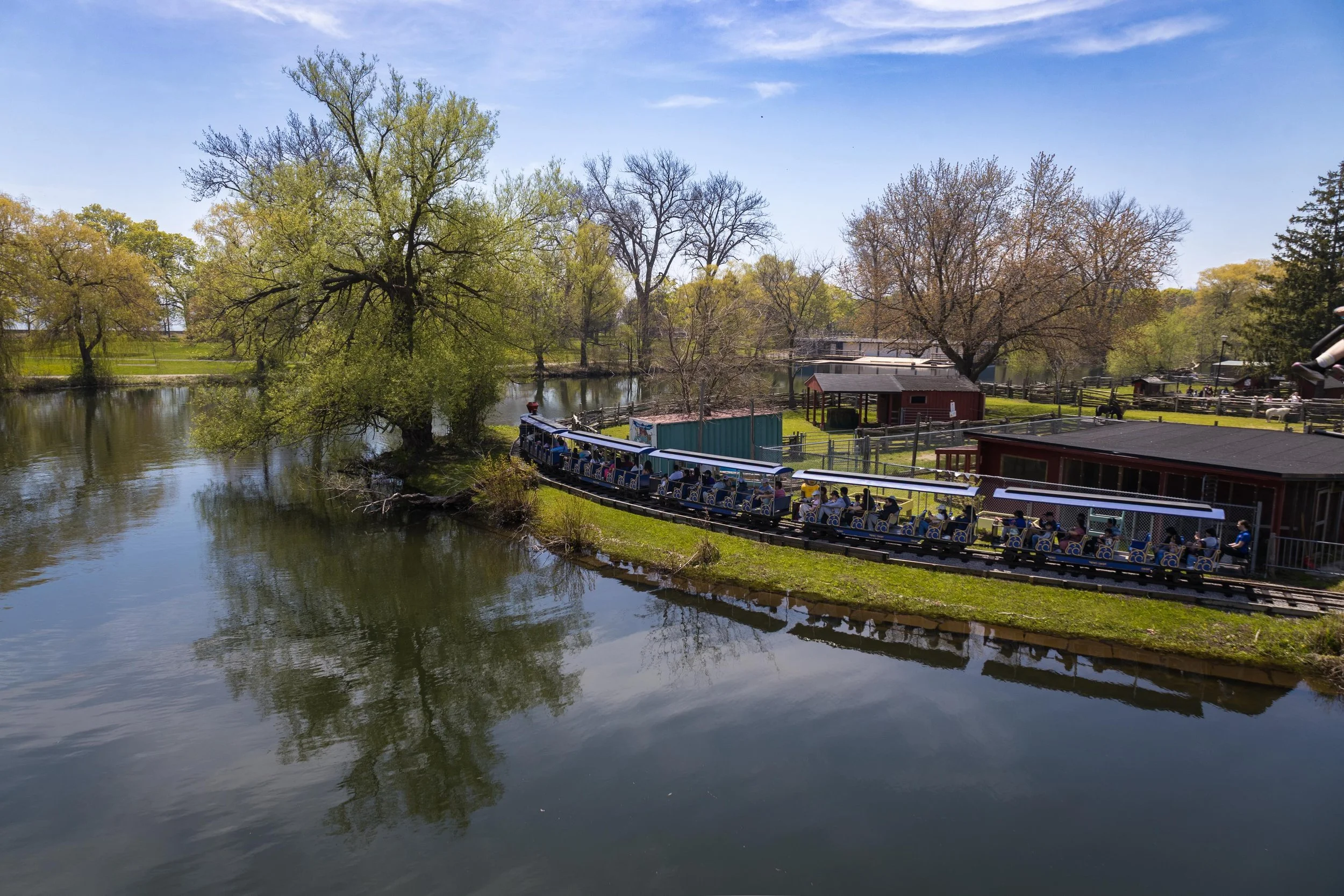 Spring at Centreville on the Toronto Islands. 

The Centreville Train making its way around the lagoon on a warm May afternoon at the Toronto Islands. One of those places that still feels exactly like childhood every time I visit.