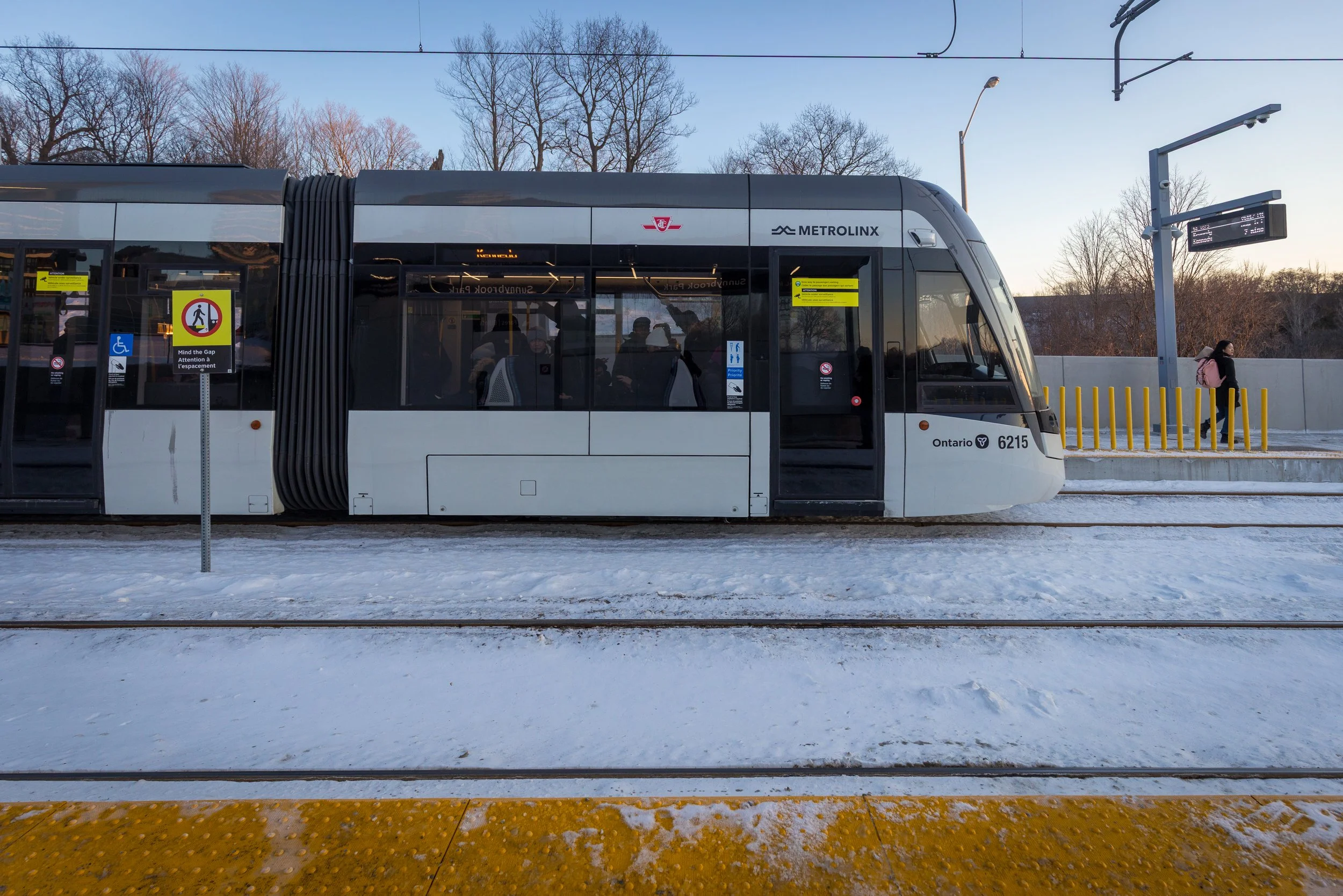Train stopping at Sunnybrook Park Station on line 5