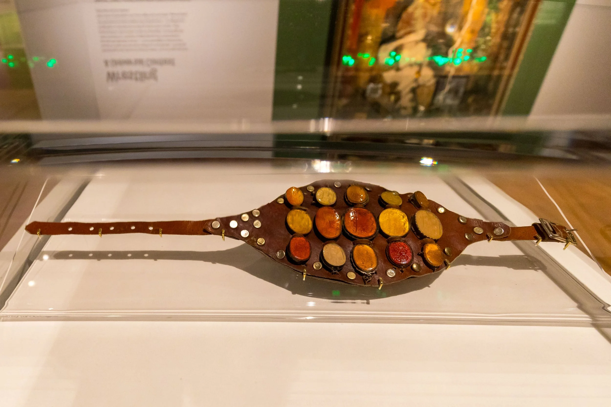 19th-century Persian wrestler’s bazoo-band (ceremonial armlet) from Tehran with engraved metalwork and decorative stones.