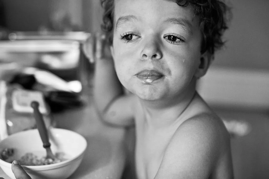 Sam Eating Breakfast in Black and White