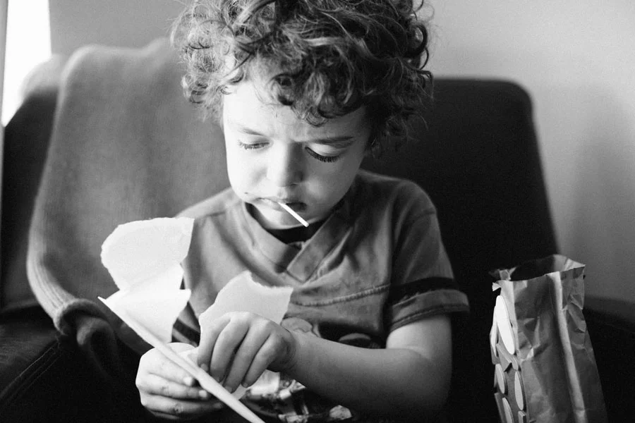 Sam Opening His Valentine's From School