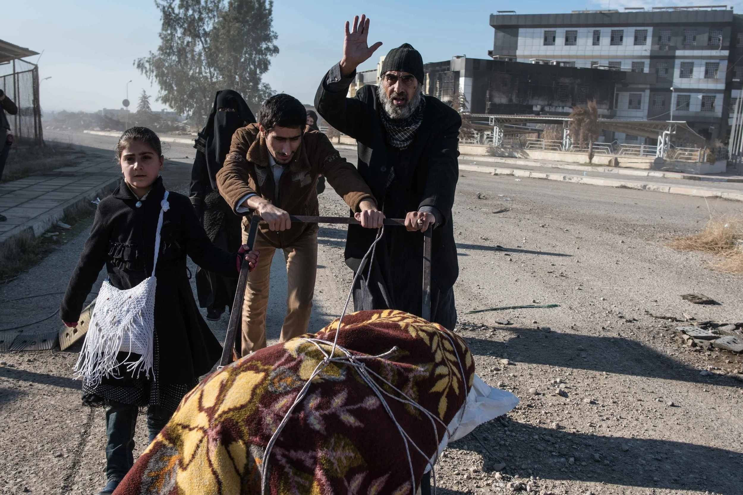 Isis mortars and coalition air strikes bring death to Mosul civilians from land and sky
