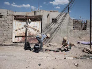 ON THE HUNT FOR ISIS WEAPONS IN MOSUL As the final fight intensifies, a Canadian researcher is just behind the frontlines, looking for clues about how ISIS is armed - Maclean's magazine