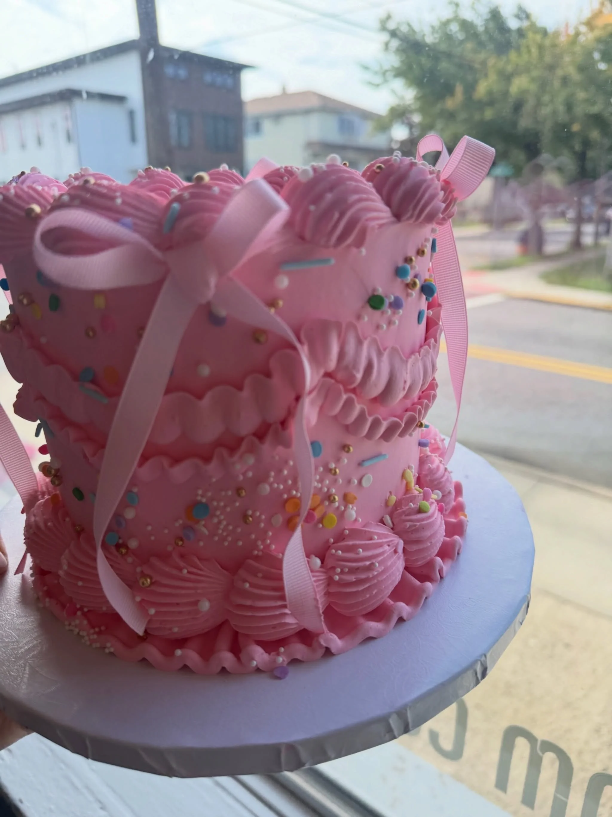 Pink, ruffles, confetti, and bows&mdash;what's not to love?!🩷

#sweetandflour #secaucus  #njbakery #customcakes #njeats