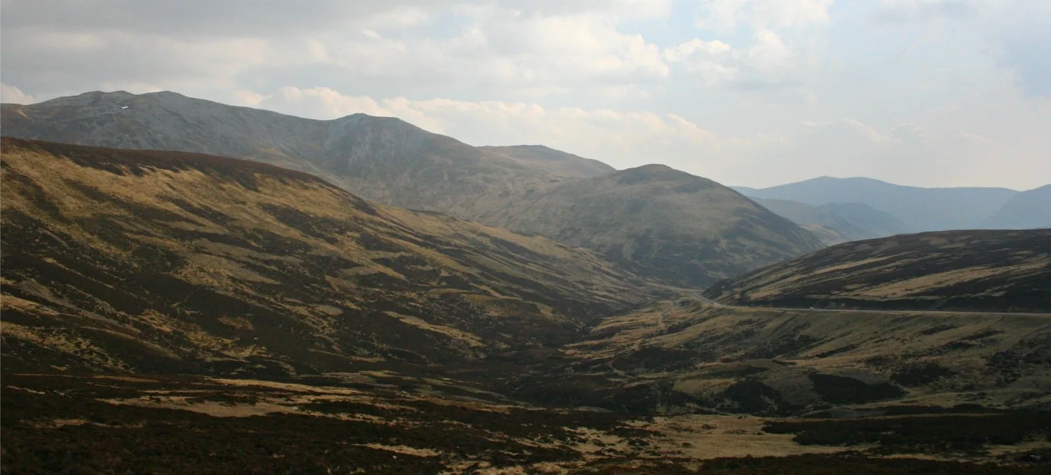 Creag Leacach, top left. A93 climbing to ski centre, right.