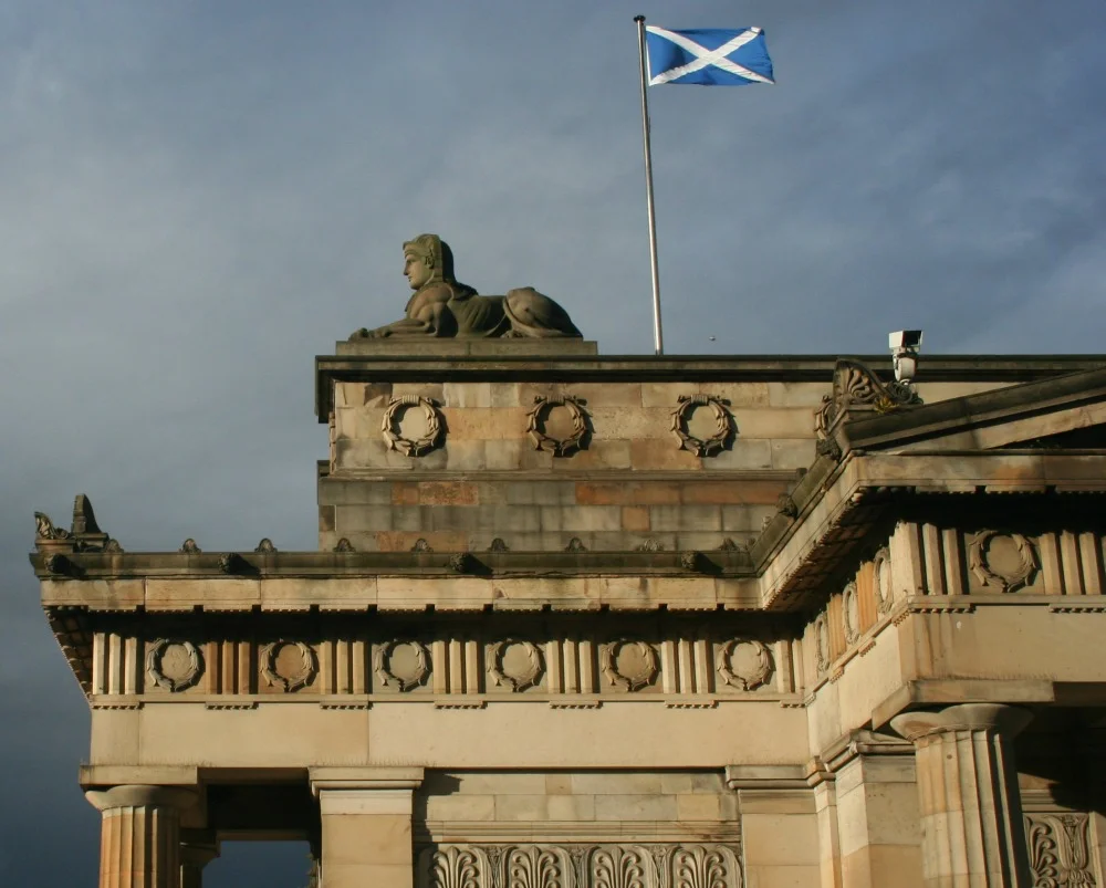 Scotland's flag, the Saltire, flying on the Royal Scottish Academy, in Edinburgh.