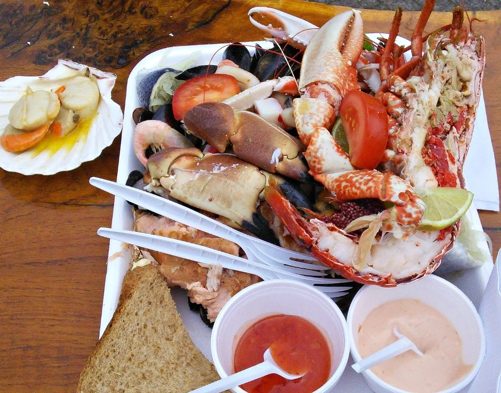 Buy yourself a seafood platter on the quayside at Oban, before catching the ferry to Mull .