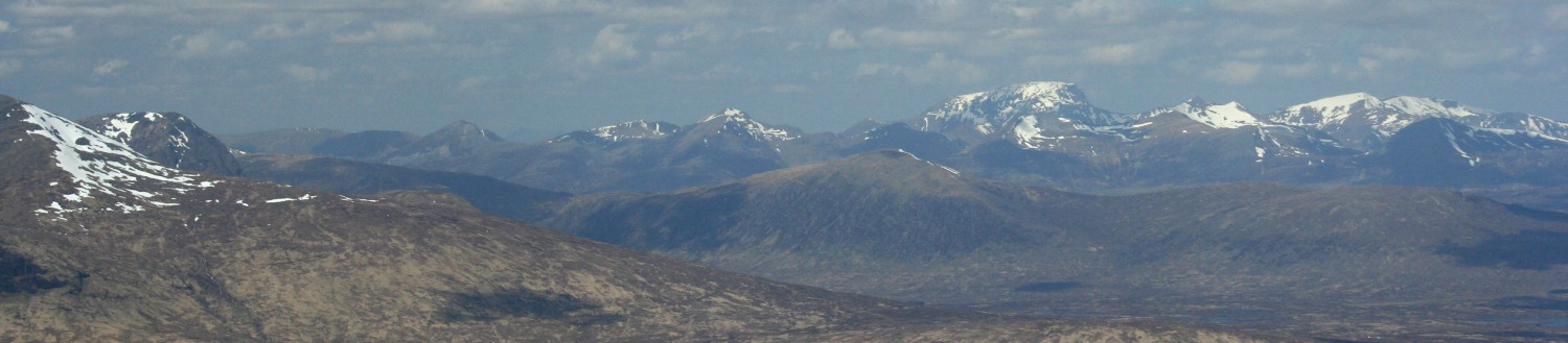 Guess which one is Ben Nevis? Yup, the tallest one, right of centre of horizon. Summit plateau showing prominently.