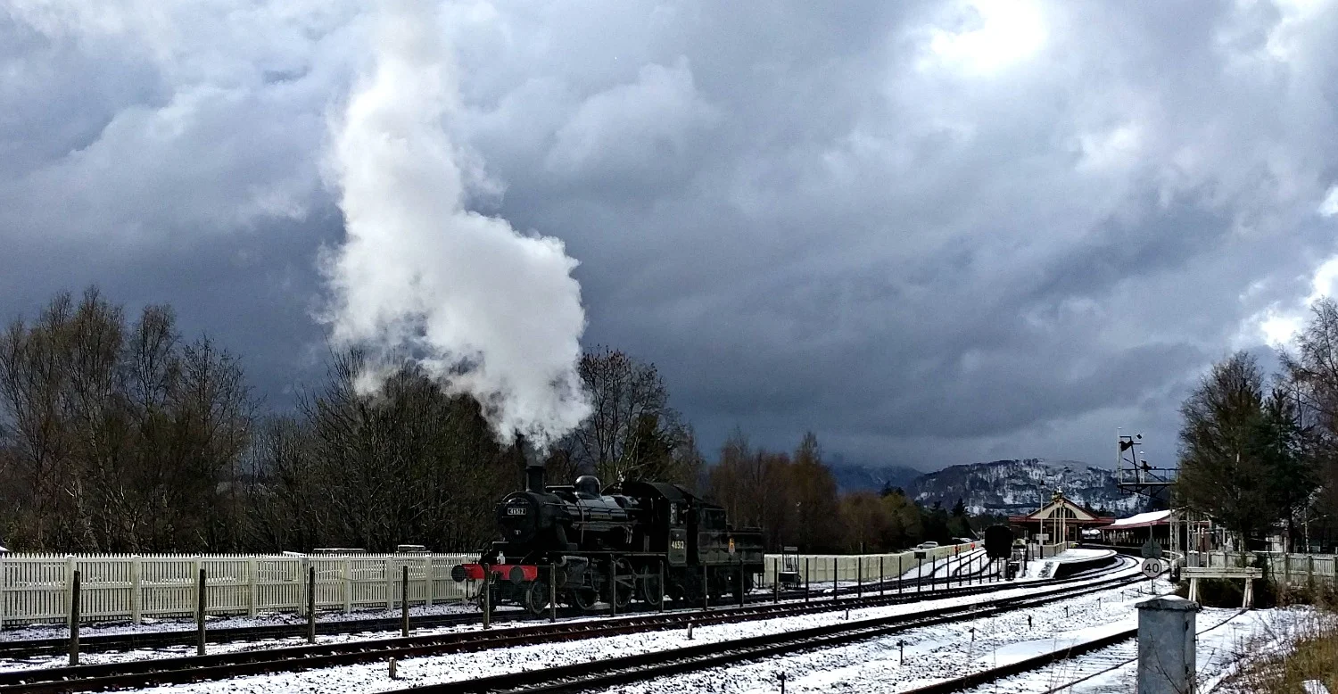Ivatt Class 2 backs down for the first train of the day from Aviemore, after a late snowfall.