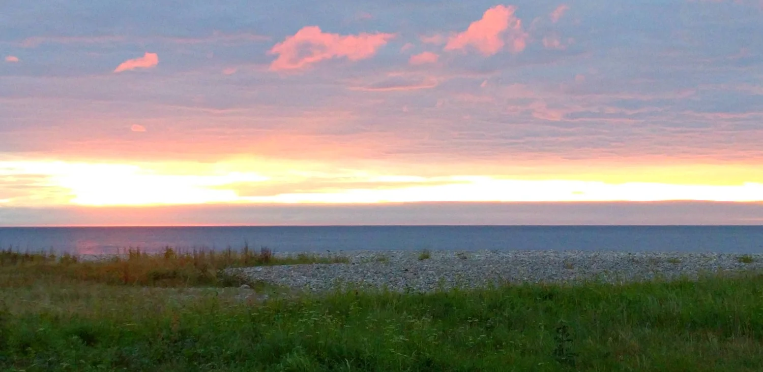 There’s still a week to go to the summer solstice, it’s after 10pm, and the sun is just going down into a cloudbank that hides the hills of Caithness, as seen from the south side of the Moray Firth. And it really isn’t going to get much darker...