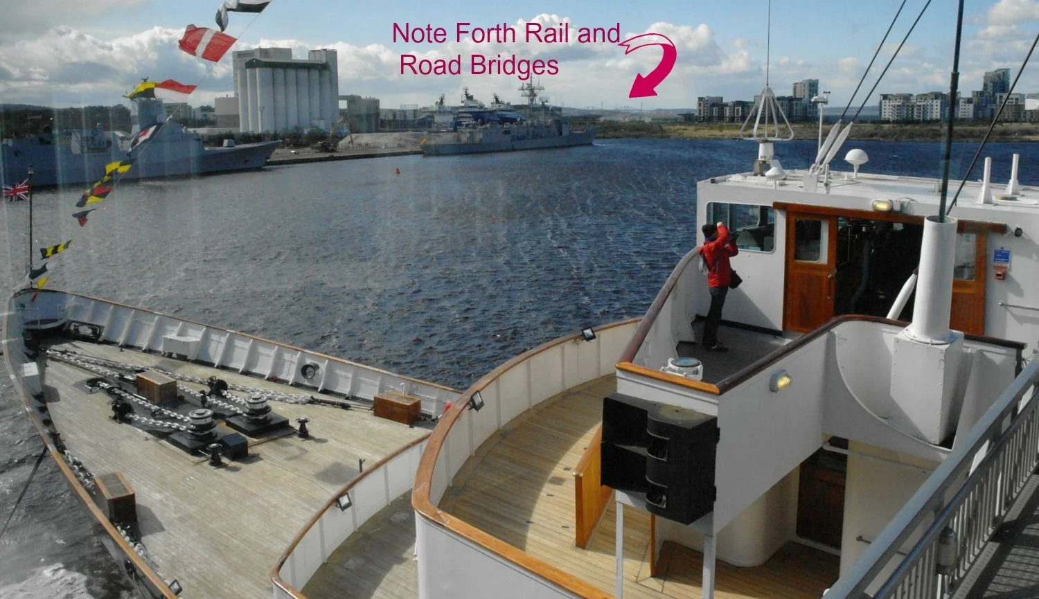 Here's the sharp end (at the front) of Britannia. Below the working bridge is the teak decked royal bridge, where the royals would go and patronizingly wave at any passing natives. The solid rail was a later addition, according to the somewhat coy commentary, installed so that the local breezes would not ruffle or blow up the royals' skirts. Really? Who cares?