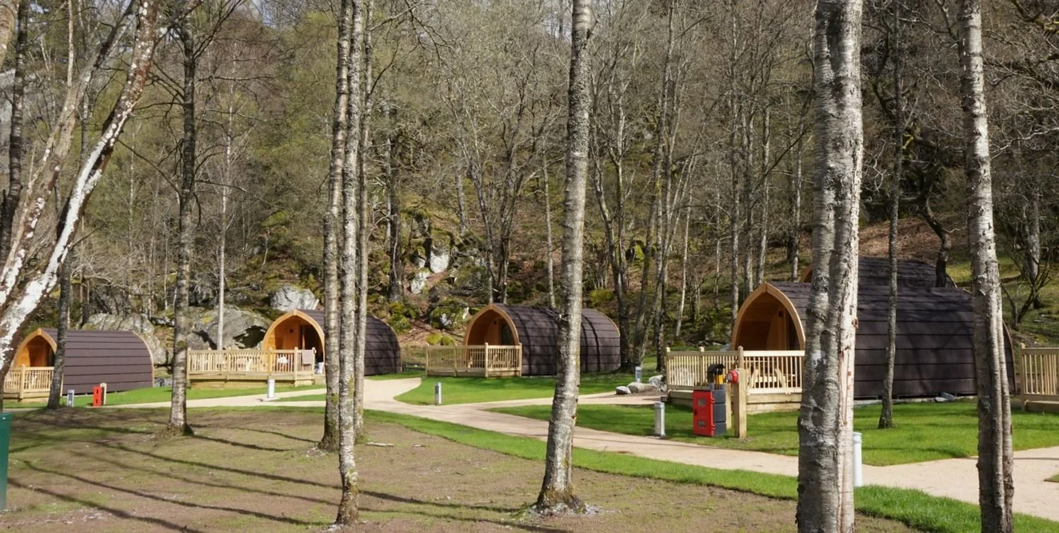 Loch Katrine Lodges. Picture taken almost at the water's edge in late spring. (Yes, it was late in 2018.)