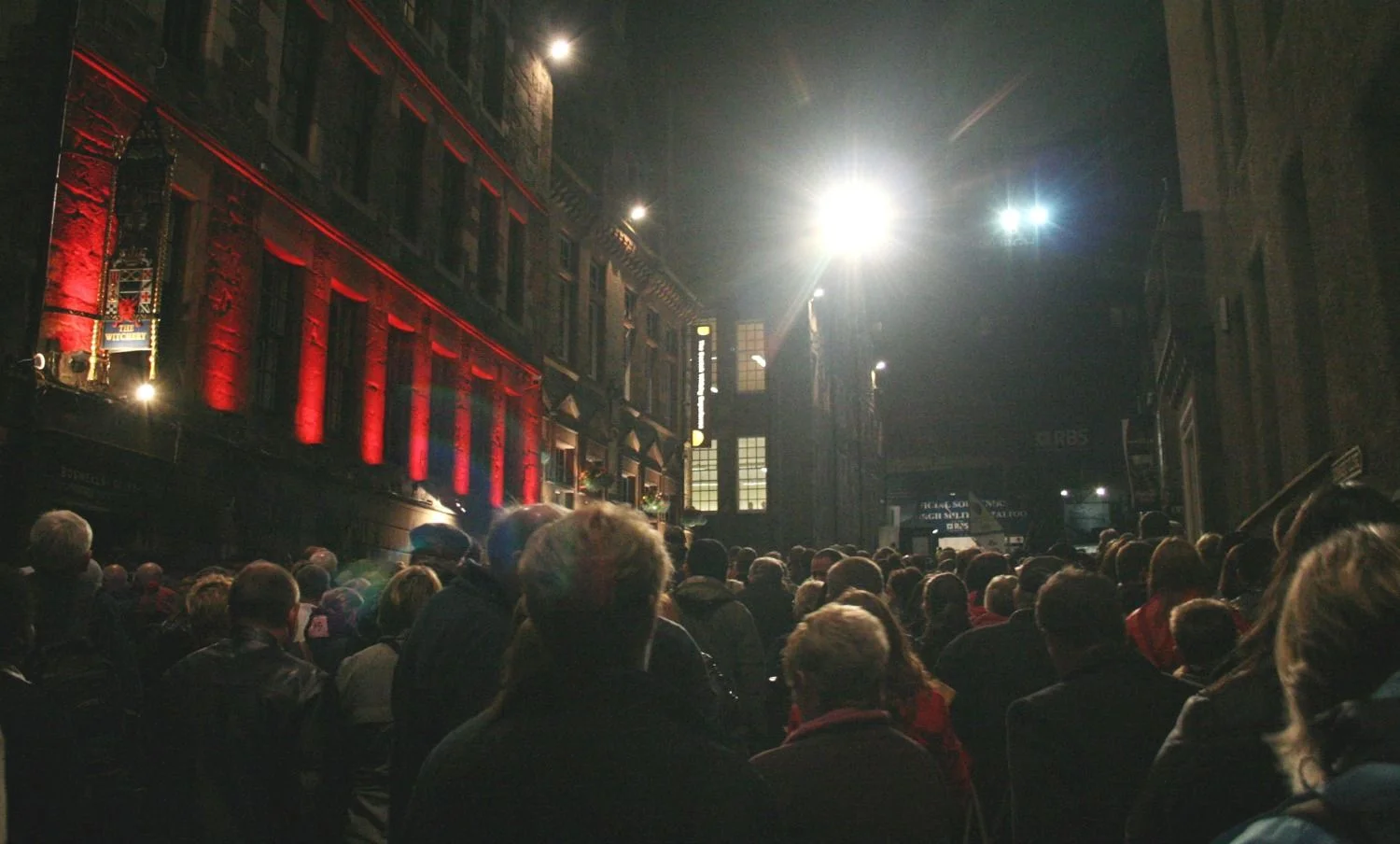 The tide surges up the top end of the Royal Mile, ready for an evening of martial spectacle and music. It's Tattoo time!