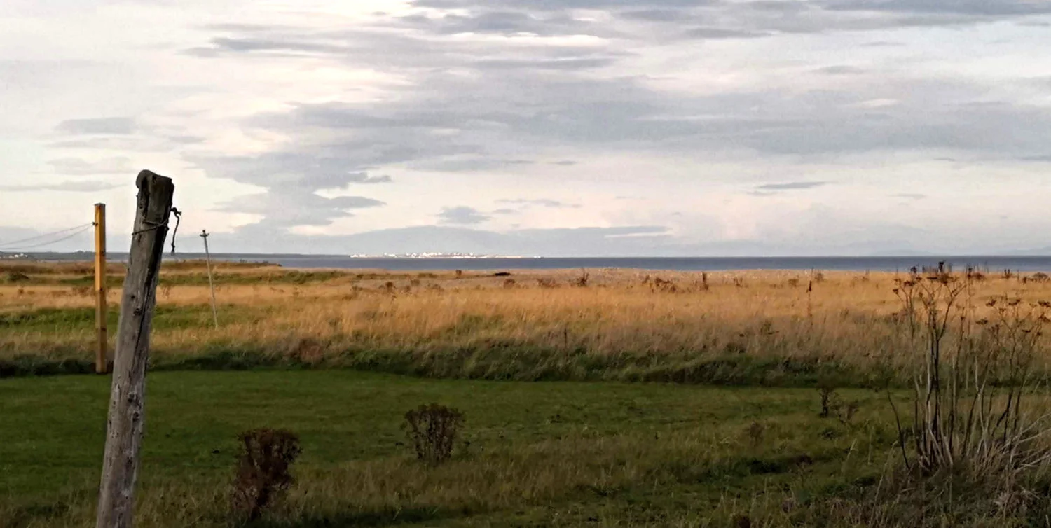 OK, so it’s an overcast day in autumn on the Moray coast. Nonetheless, the sun is lighting up the houses of Lossiemouth, on the horizon, centre. This must be the ‘‘Moray Hole’.