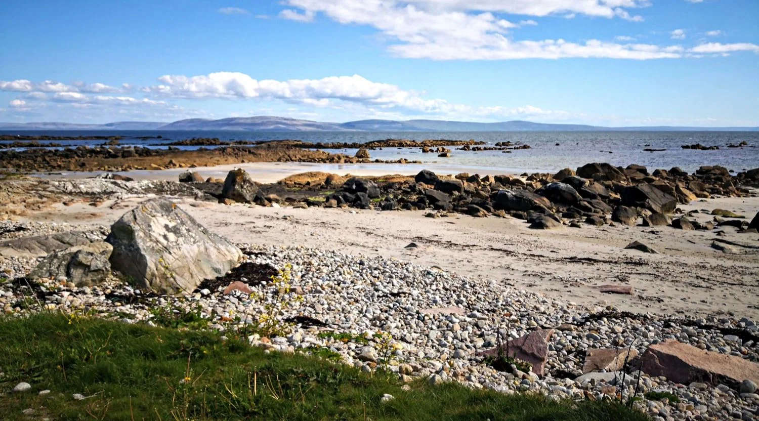 Easy to reach beach, a little way west of Galway, looking across the bay to The Burren.