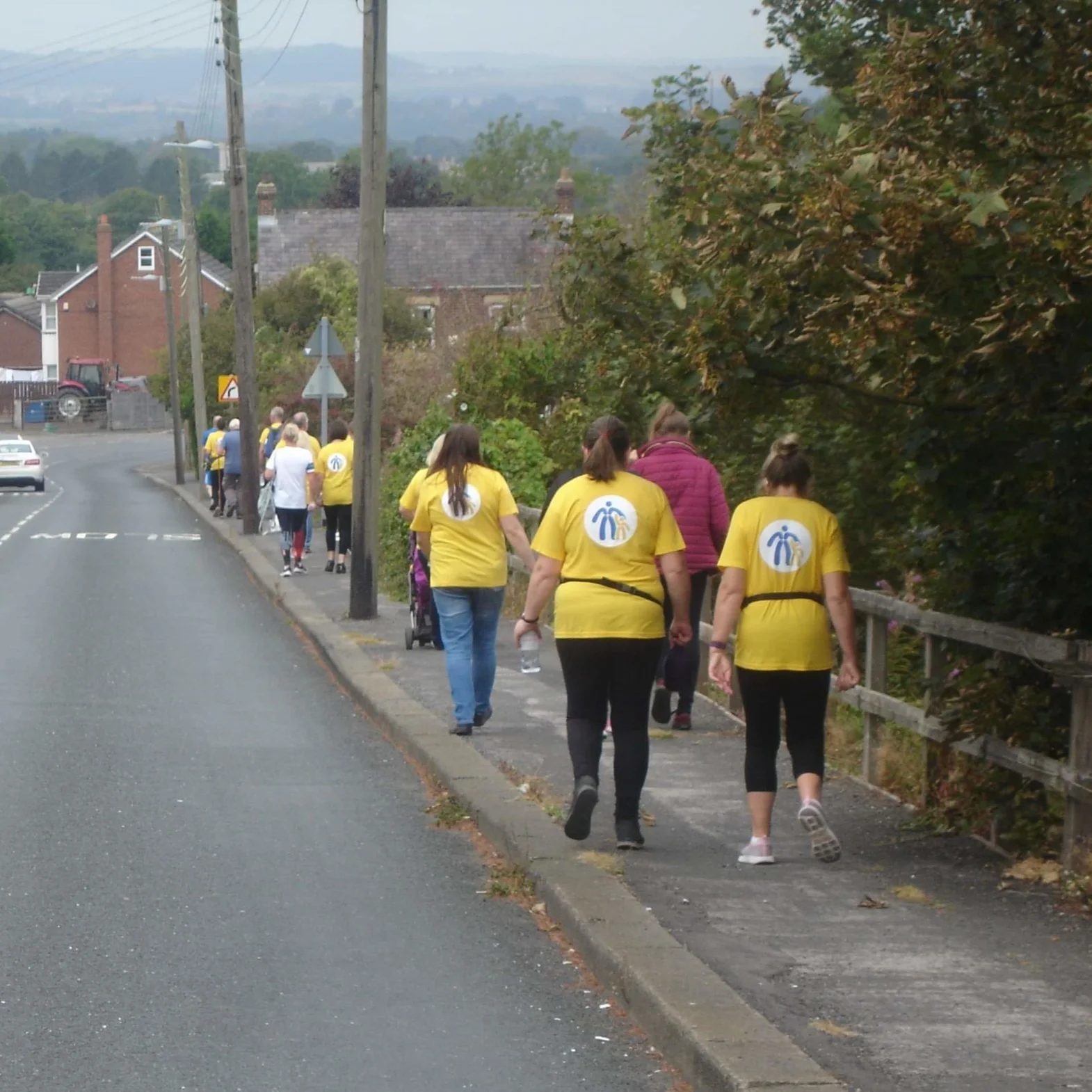 The team of 19 walked for 5.9 miles, raising nearly £1,200