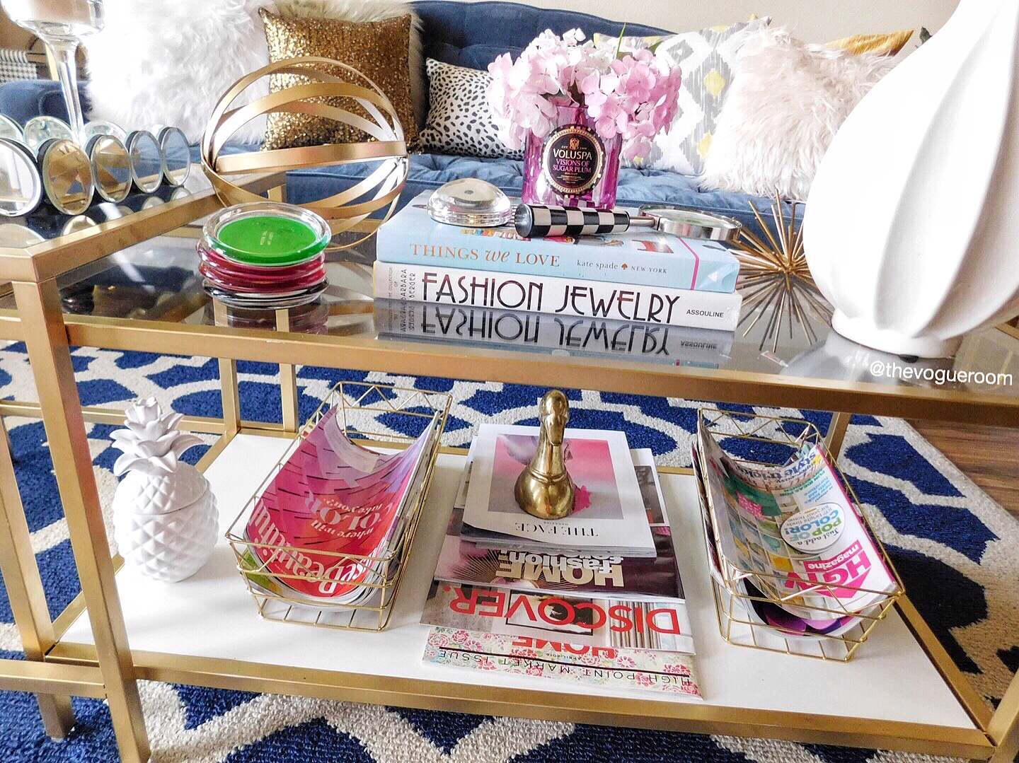 This is how I accessorize my living room coffee table. I'm always adding and changing things, but I think this coffee table speaks to my style and personality. It's so glam and I LOVE IT!
