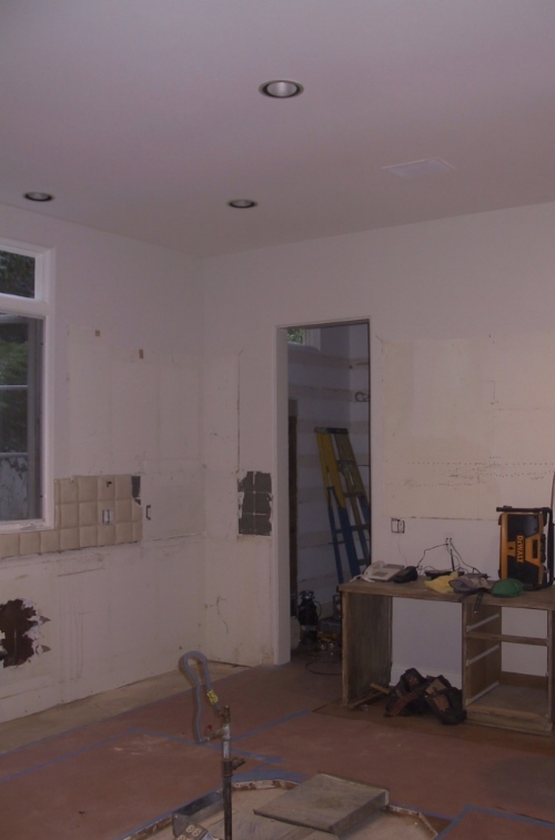 before refridgerator and pantry entrance wall