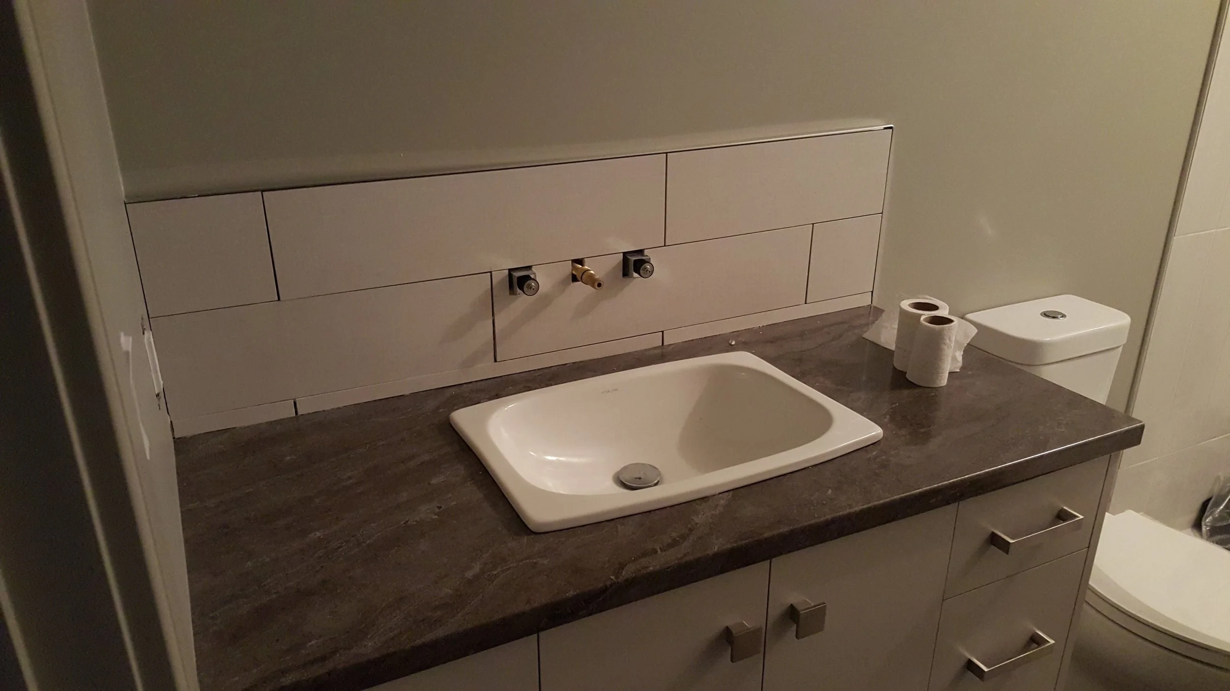 Backsplash with Wall mounted faucet.jpg