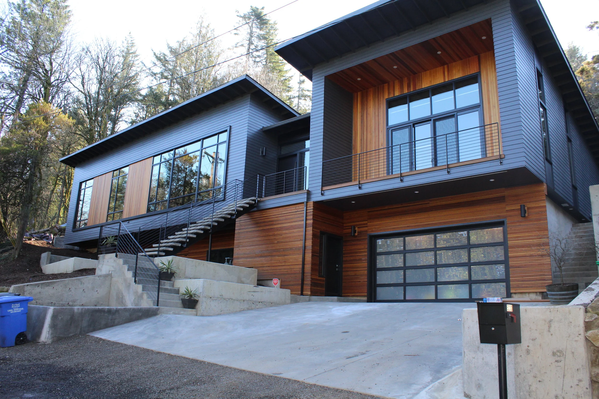  Builder: Beyer Construction and Development  New custom home built in the SW Hills.  Very complex slope with challenging site constraints.  The Murphy’s residence turned into a beautiful NW contemporary. 