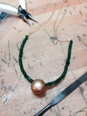 HANDMADE 14K GOLD BEAD WITH EMERALDS