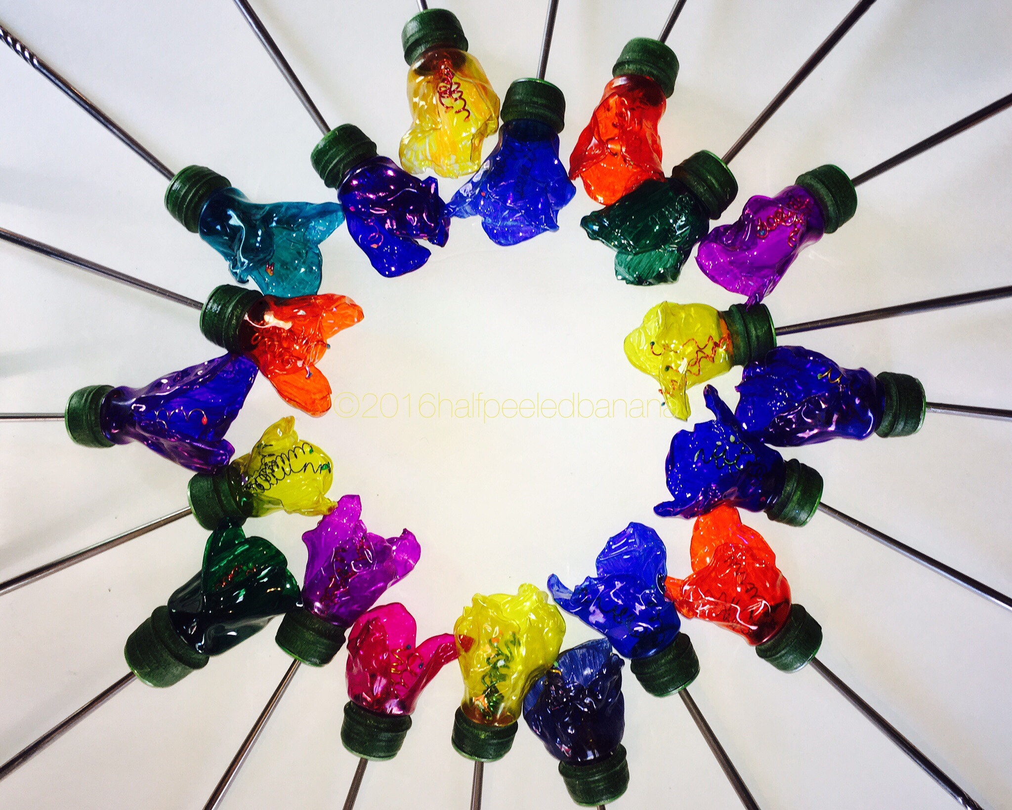circle of color! bright tabletop flowers made from upcycled water bottles!