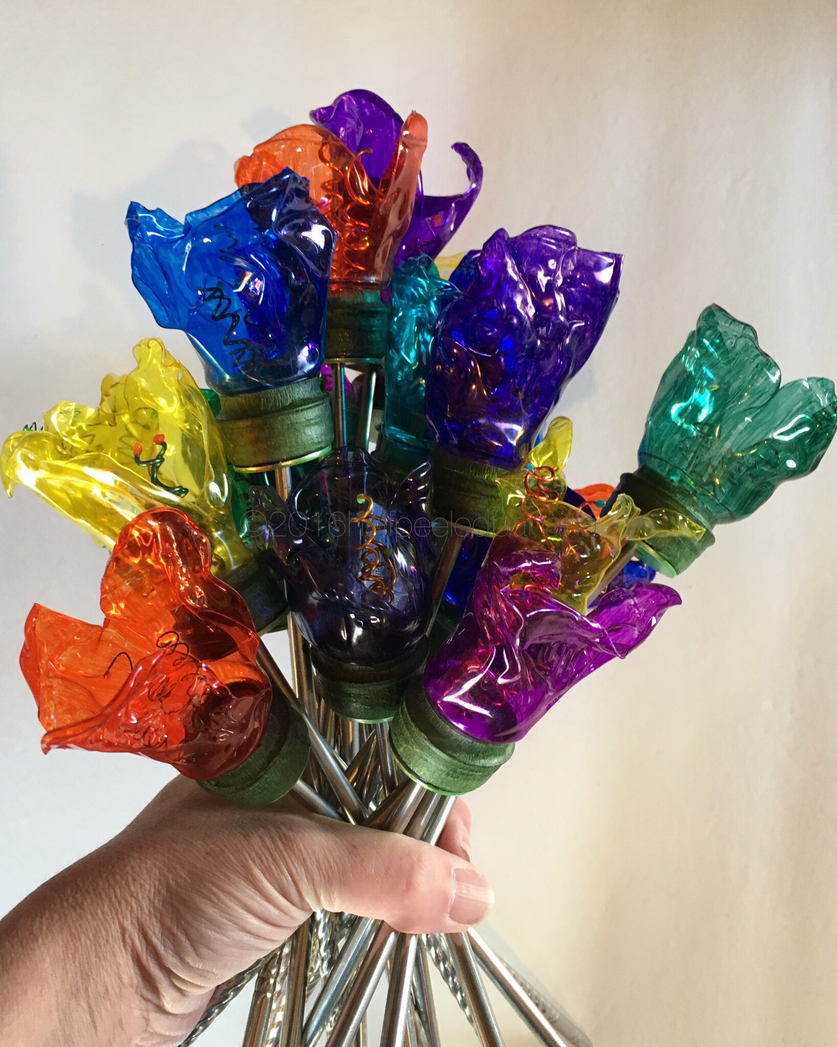 give a little love to the earth and others! upcycled water bottle bouquet!