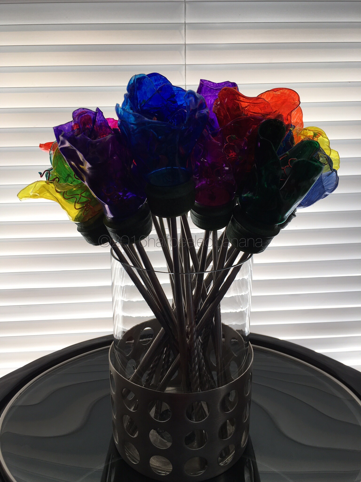 beautiful maintenance-free upcycled water bottle flowers for the office!!