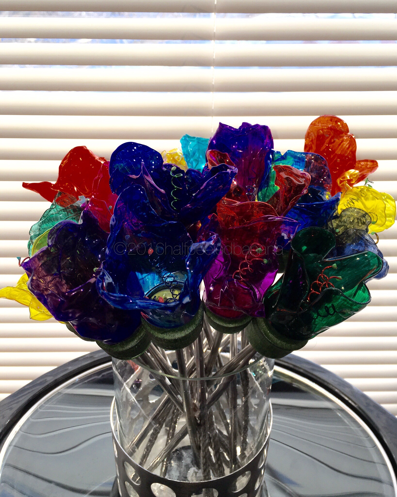 from my home to your home! upcycled water bottle flowers with silver stems!
