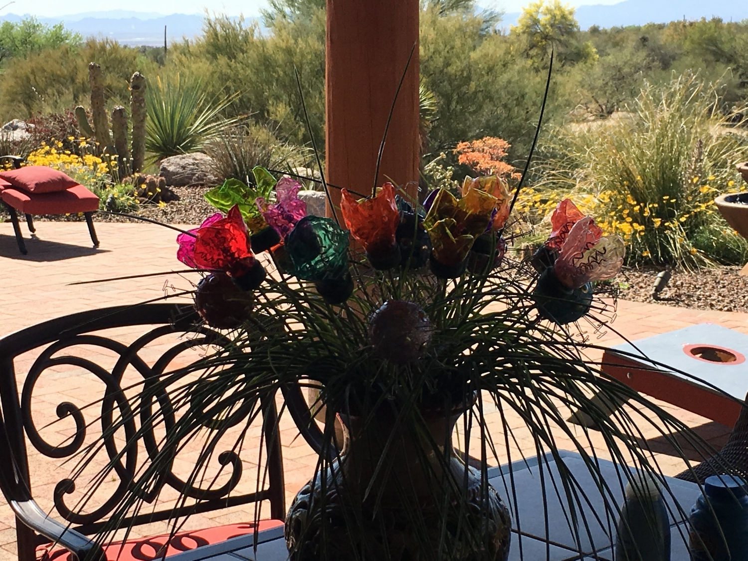 stunning upcycled water bottle flowers adorn a Tucson patio!