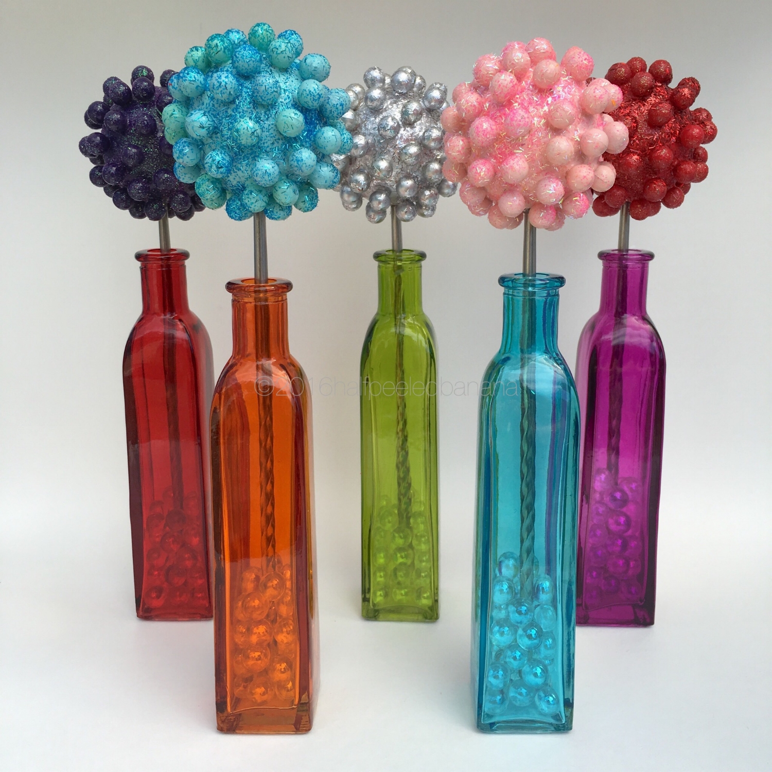 bright tabletop flowers 3" nubs style in dark purple, light blue,, silver, light pink and red