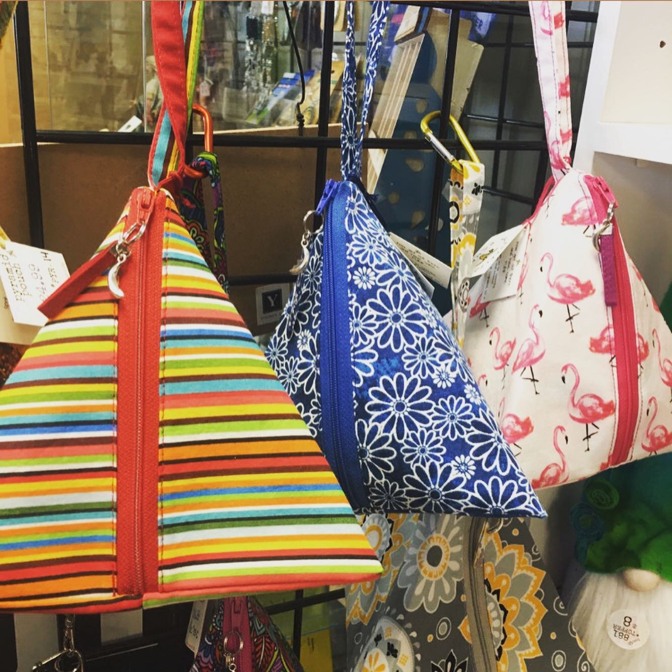 New PYRAMID POUCHES!! Perfect little wristlets by #halfpeeledbanana !🍌🍌Available now at @curatemercantile Stop by this weekend during their #shoplocal Spring Event (or any day) to grab your own!! 
🍌
Contact me if you have a specific design you wan
