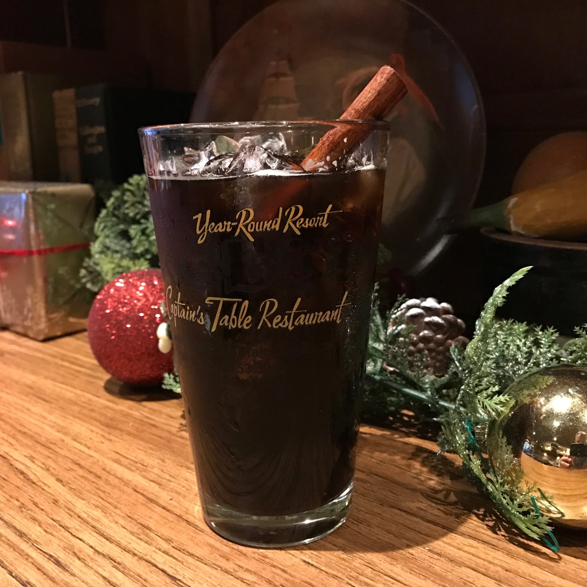 SPICED CHOCOLATE STOUT Brandy, spicy simple syrup with ground red pepper and cinnamon, Southern Tier Brewing Co. Chokolat served in a pint glass and garnished with a fresh cinnamon stick. 