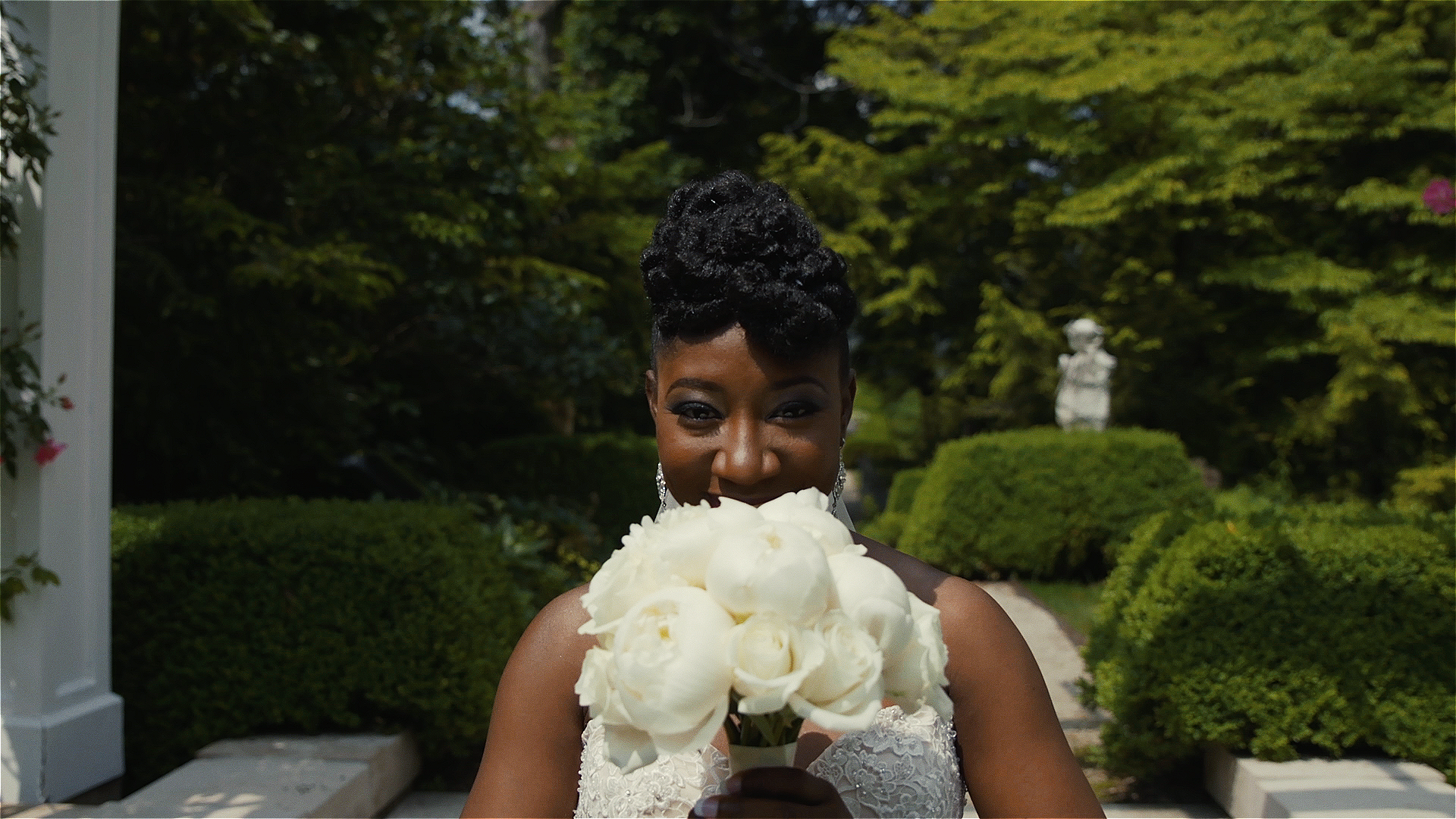 This shot was thought of on the fly, I had the Bride cover her face with her bouquet and proceed to slowly reveal her face, it came out great!