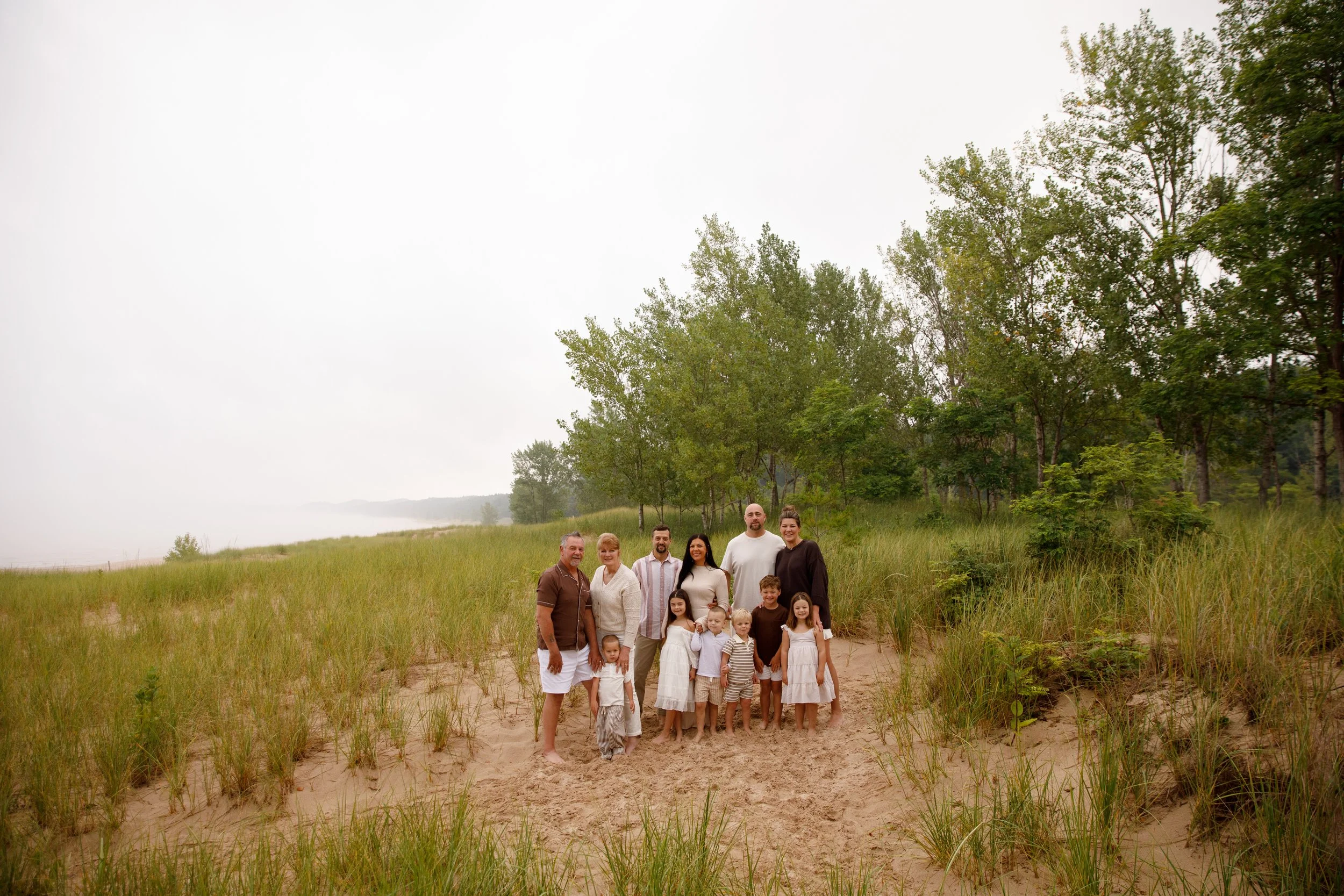 JessicaMax-michigan-family-photographer-pentwater-extended-family-session-documentary-sunrise-12.jpg