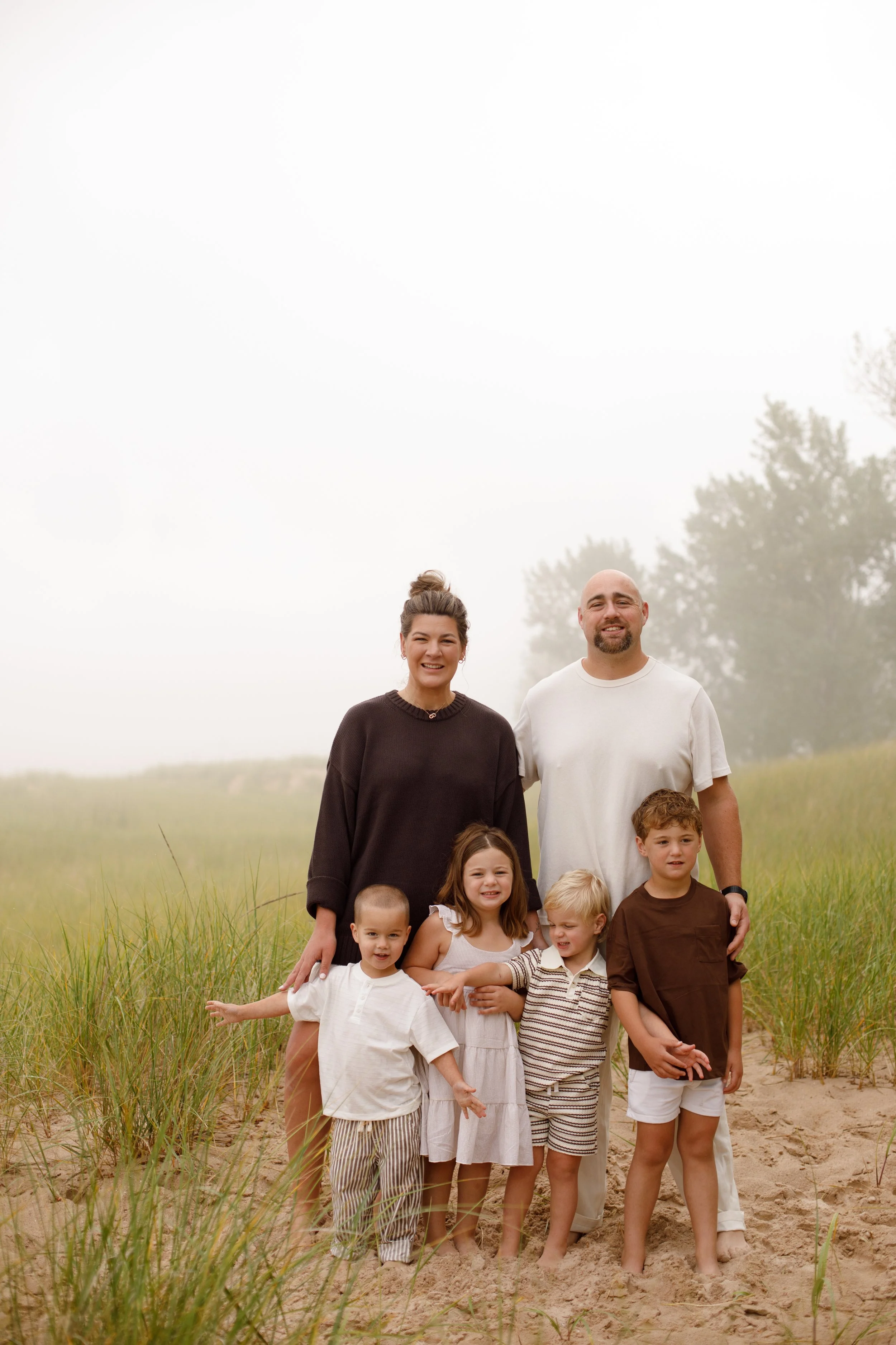 JessicaMax-michigan-family-photographer-pentwater-extended-family-session-documentary-sunrise-17.jpg