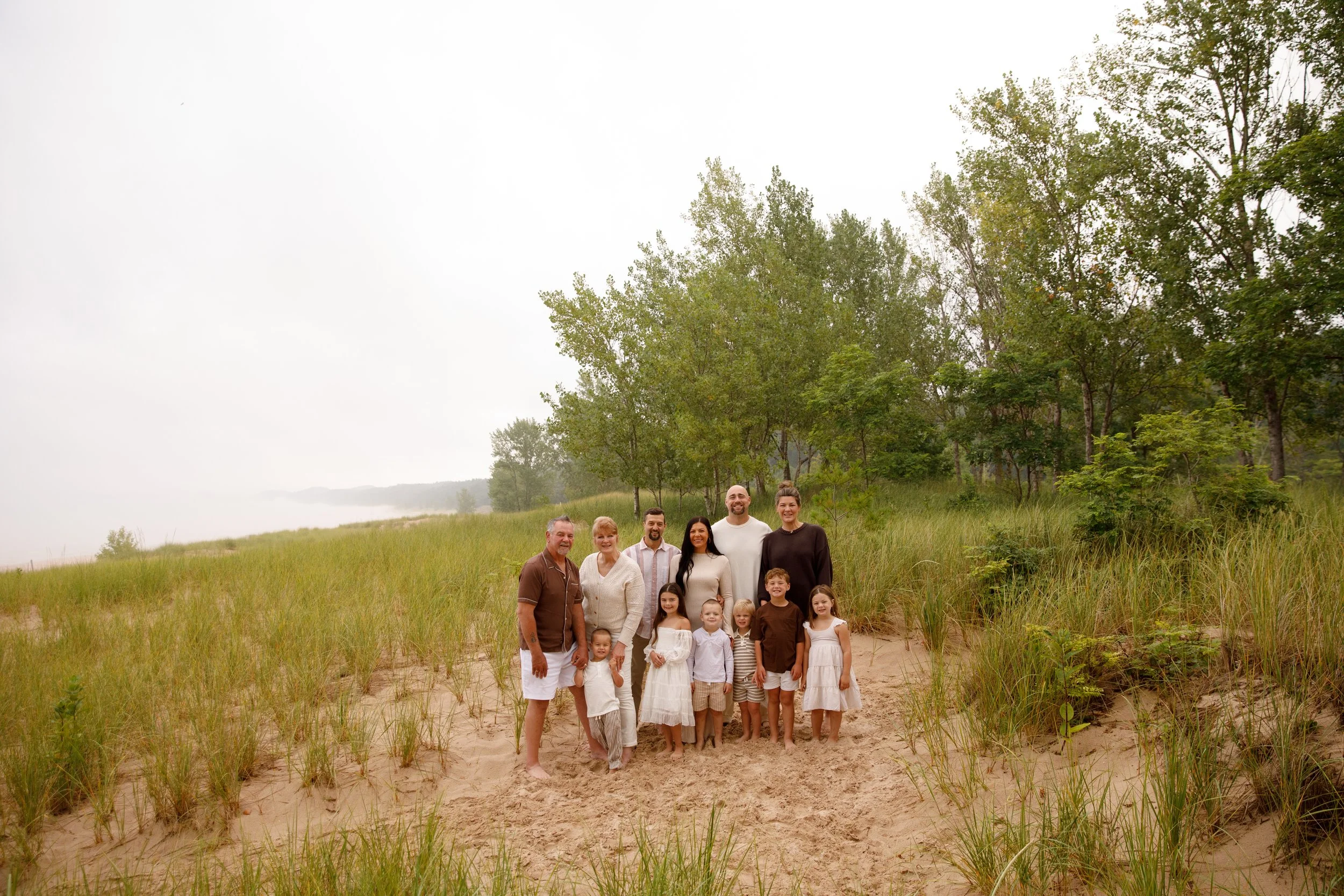 JessicaMax-michigan-family-photographer-pentwater-extended-family-session-documentary-sunrise-24.jpg