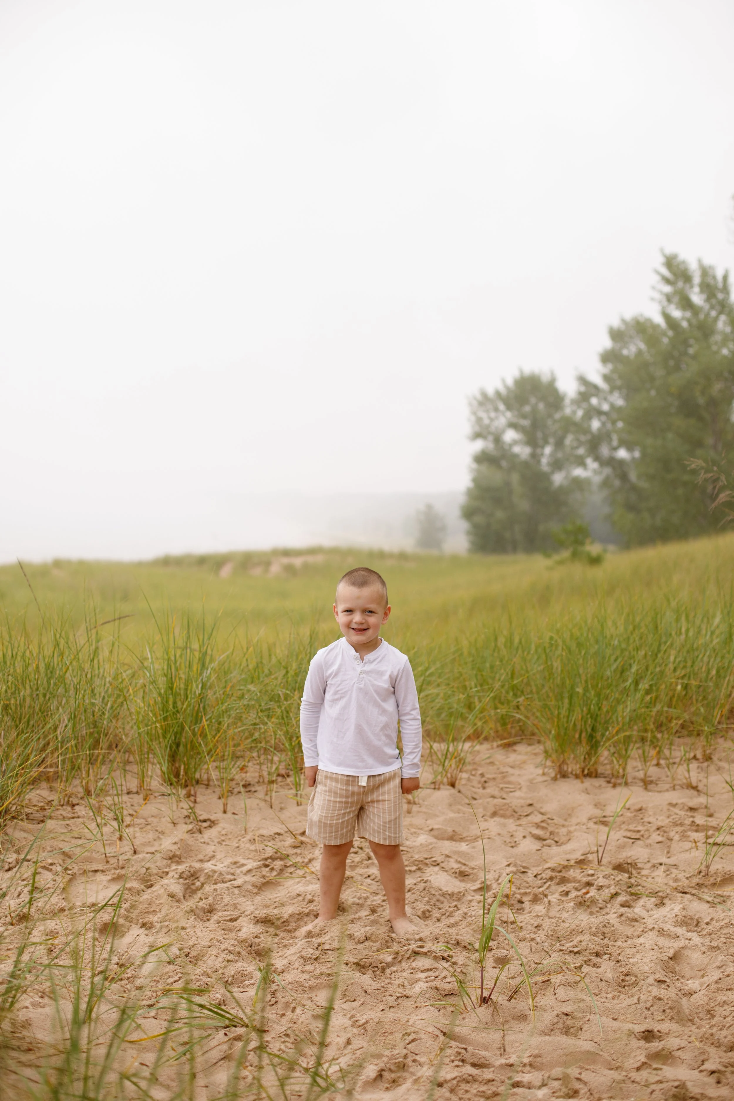 JessicaMax-michigan-family-photographer-pentwater-extended-family-session-documentary-sunrise-44.jpg