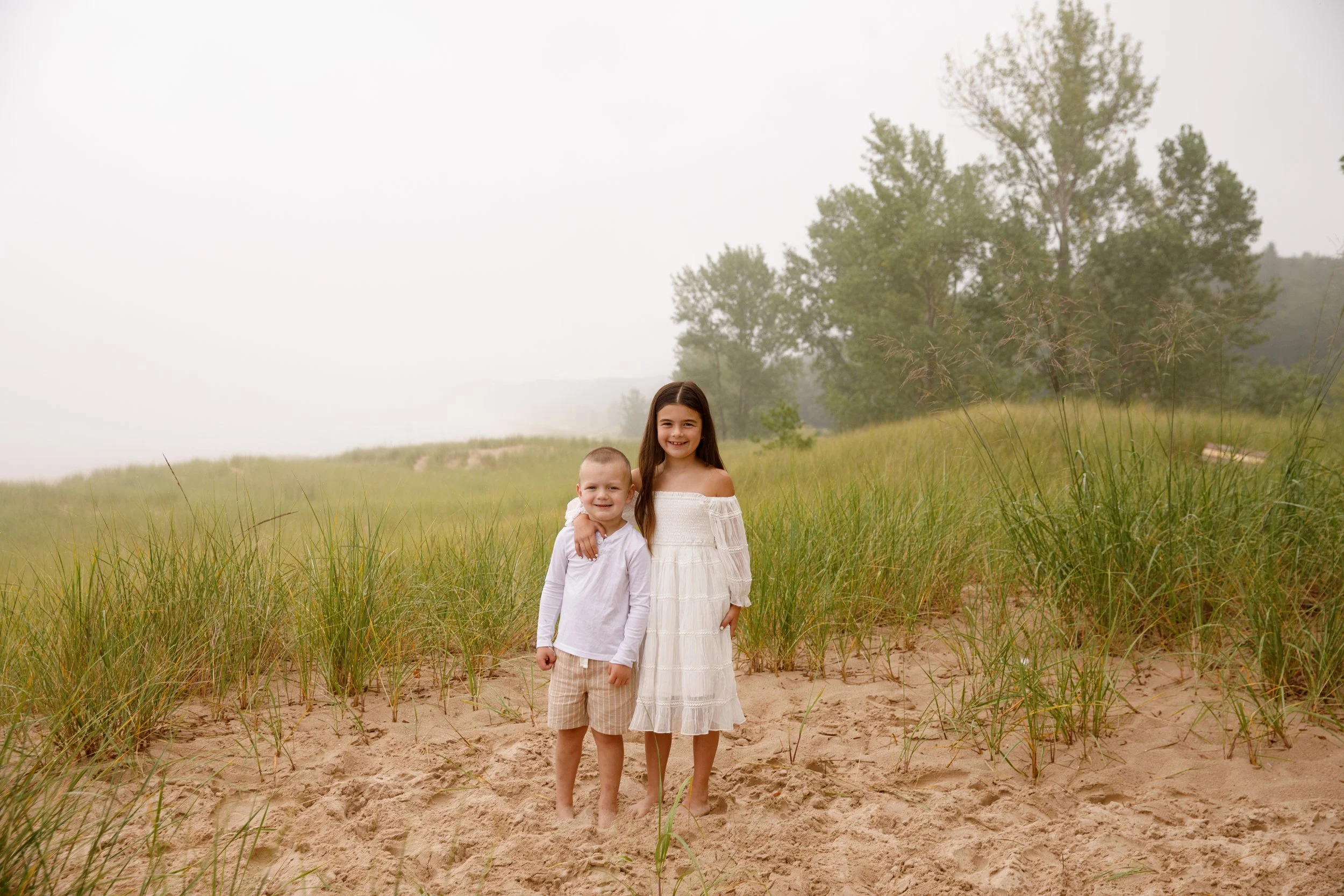 JessicaMax-michigan-family-photographer-pentwater-extended-family-session-documentary-sunrise-67.jpg