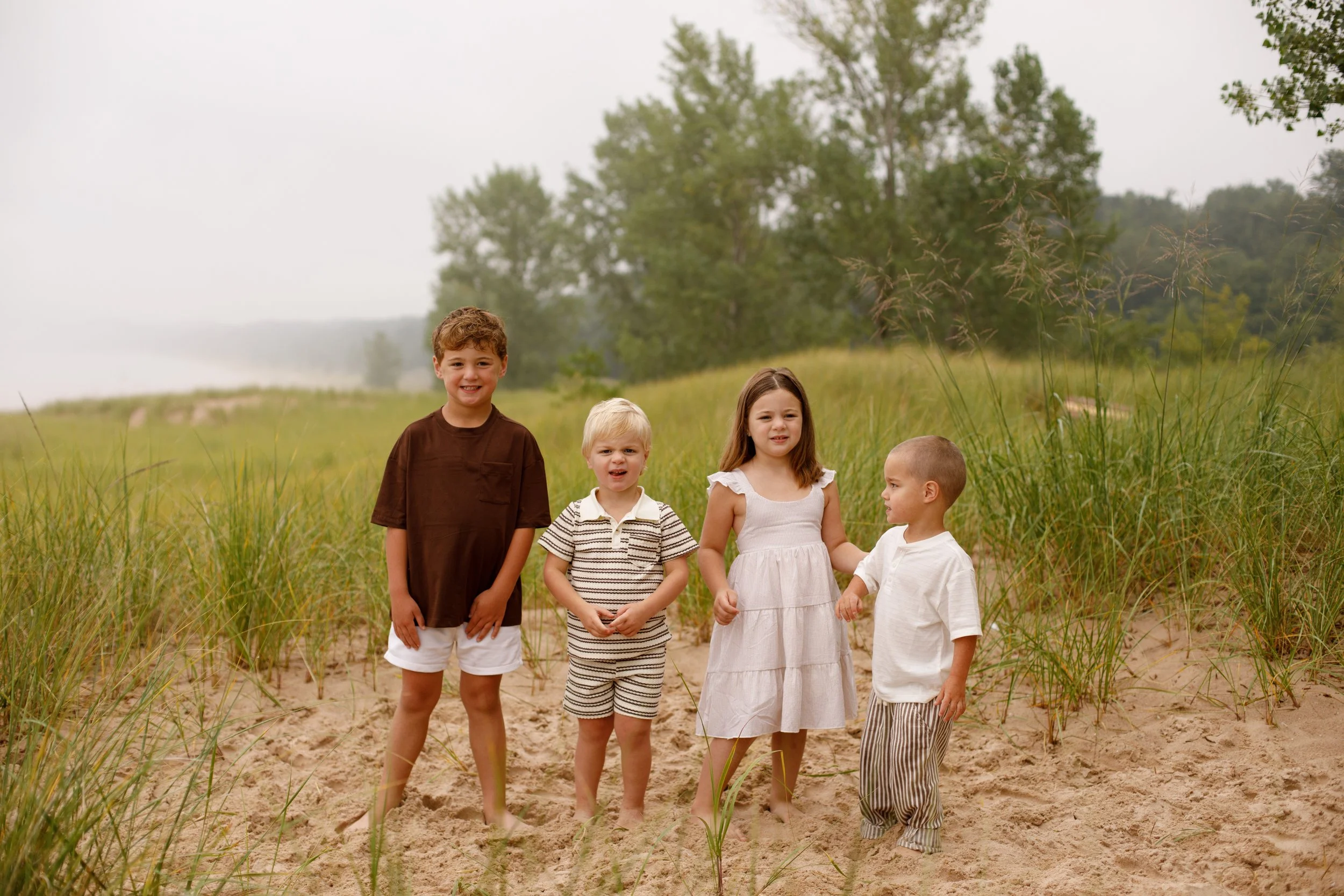 JessicaMax-michigan-family-photographer-pentwater-extended-family-session-documentary-sunrise-97.jpg